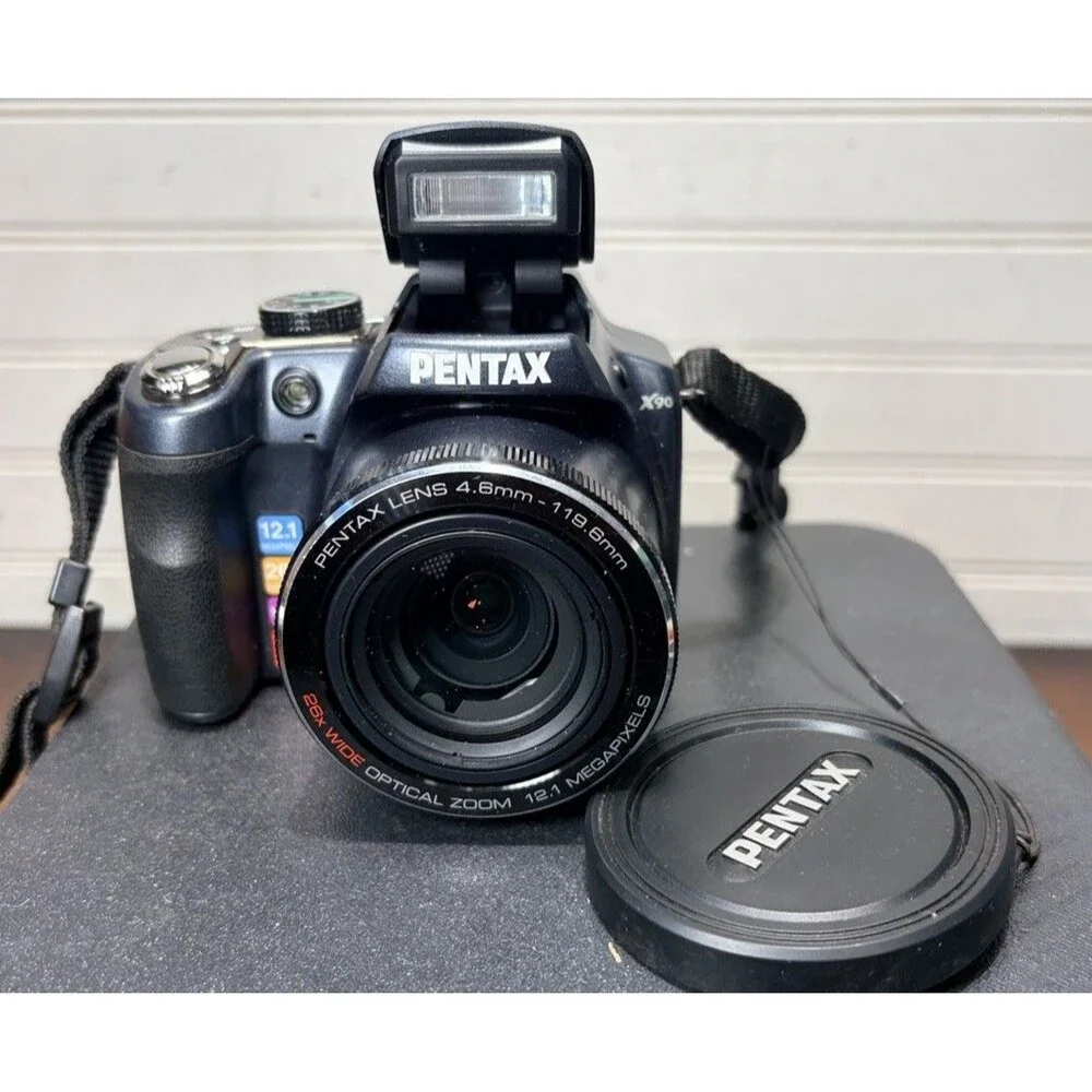 Pentax X90 12.1MP Digital Bridging Camera w/manual, Battery, Charger & Strap